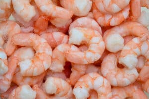 A pile of frozen shrimp.
