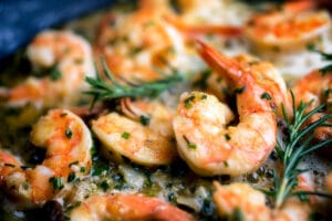 A plate of buttered shrimp scampi.