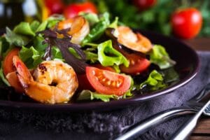 A bowl of Shrimp and Tomato Salad.