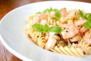 A plate of shrimp pasta salad.