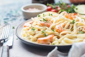 A plate of shrimp pasta.
